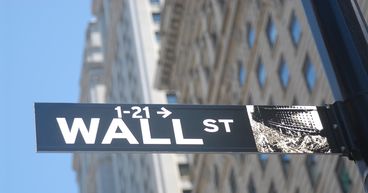 US stocks close higher as Fed meets on rate hike; PFE, BP, WDC rally