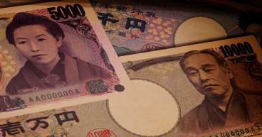 BOJ policymaker vows to keep ultra-low rates until wages perk up