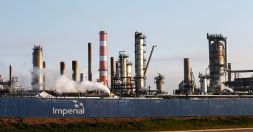 Oil surges after strong U.S. jobs data