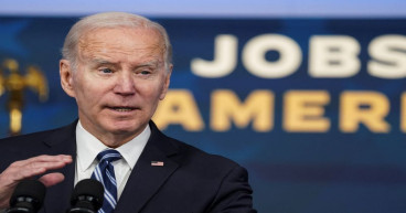Biden hails January jobs report, waves off inflation question