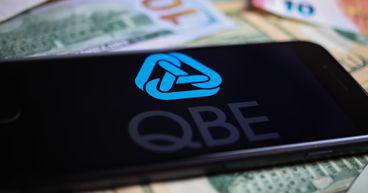QBE (ASX:QBE) sees catastrophe costs of AU$1,060 in FY22, flags outlook risk