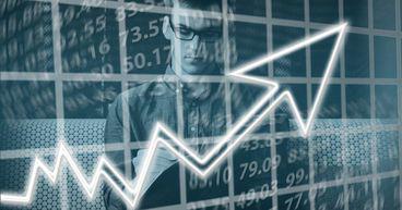 TSX gains as energy & base metals rebound, loonie up