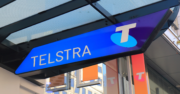 Telstra (ASX:TLS) lifts dividend despite drop in profits & earnings