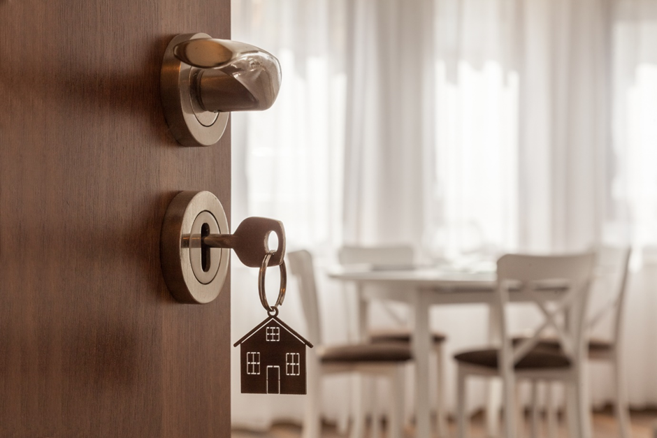 Door Handle With Key And Home Shaped Keychain.