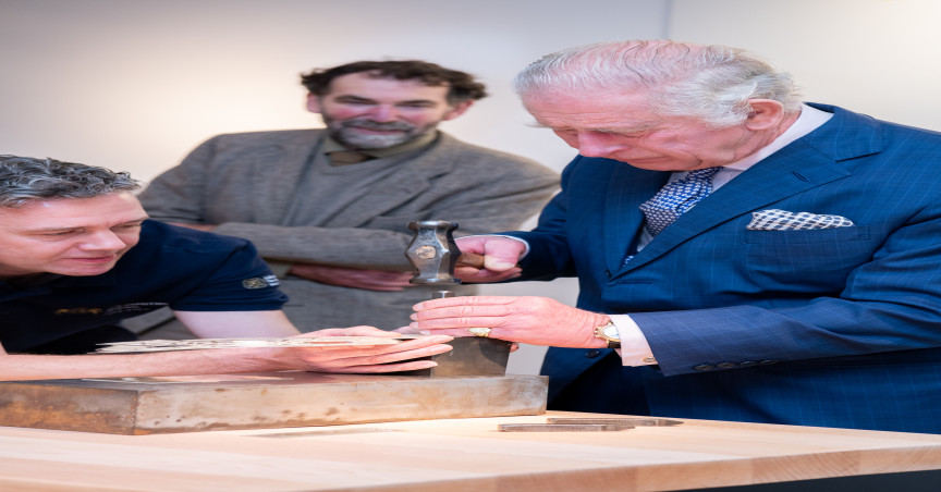 King Charles III hallmarking the King's Mark on the silver Cross of Wales last year. (Julia Skupny)