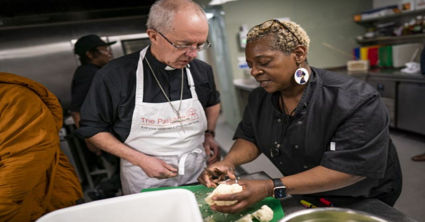 Justin Welby prepares food