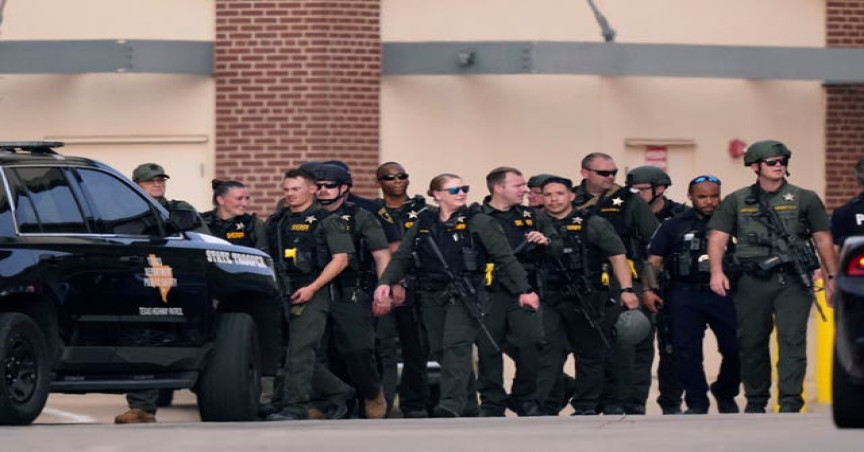 Law enforcement officers at a shopping centre after a shooting Saturday, May 6, 2023, in Allen, Texas