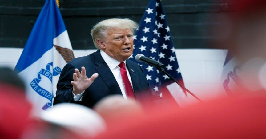 Former president Donald Trump visits with campaign volunteers at the Grimes Community Complex Park in Des Moines, Iowa