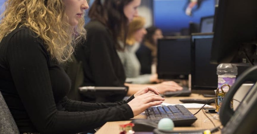 Women working at desk in office