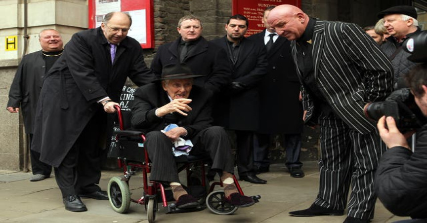 Ronnie Biggs talks with Dave Courtney (right) at the funeral of Bruce Reynolds, the mastermind behind the Great Train Robbery of 1963 at St Bartholomew The Great Church in Smithfield, London.