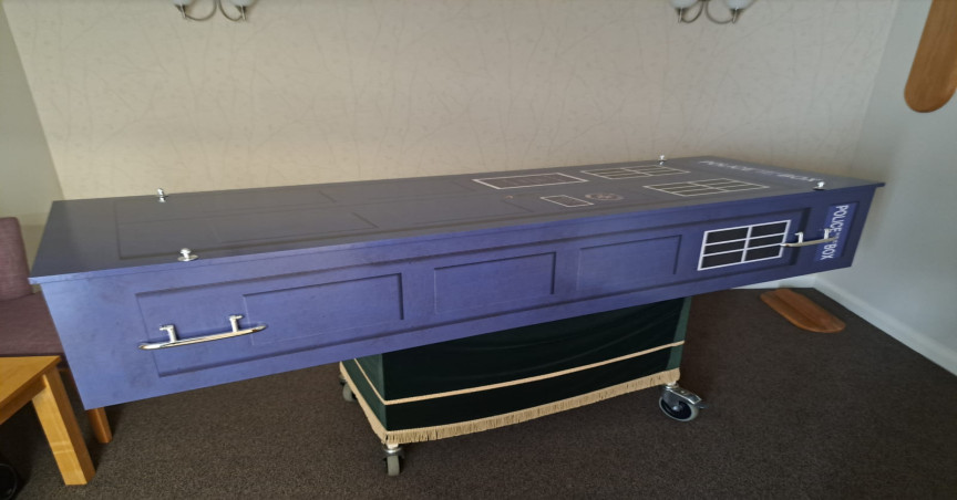Rob's custom-made coffin of the Tardis from Doctor Who 