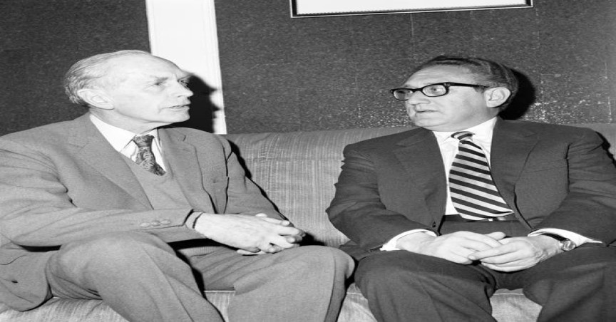Henry Kissinger during an hour-long chat with then foreign secretary Sir Alec Douglas-Home in 1974 