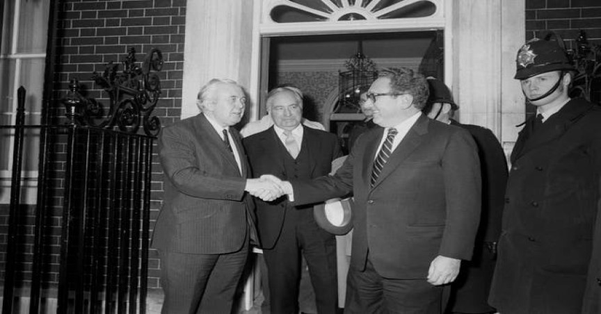Former prime minister Harold Wilson with Mr Kissinger in March 1974 