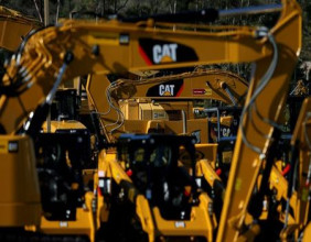Caterpillar profit falls as costs weigh Caterpillar profit falls as costs weigh