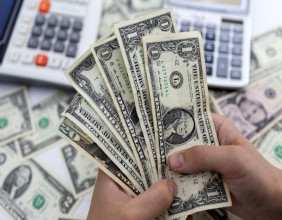 Dollar pares losses after Fed statement Dollar pares losses after Fed statement