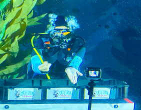 Avery Fisher sets Guinness World Record at Aquarium of the Bay, San Francisco