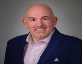 PATRICK RICCARDS SELECTED AS TOP BUSINESS LEADER OF THE DECADE BY IAOTP