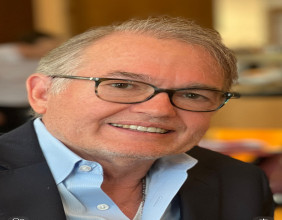 A CONVERSATION WITH AUTHOR JOHN GRAY
