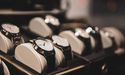 What made the Watches of Switzerland Group to pay back furlough support obtained from the UK government?
