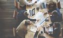 What moved business optimism in UK directors at a record high?
