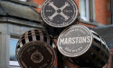  UK pub group Marston's returns to annual profit; flags cost pressures 