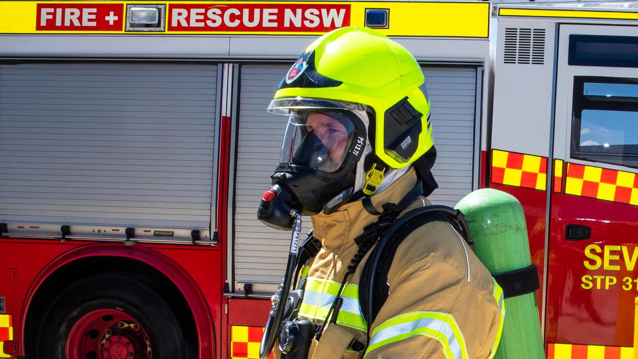 Woman jumps from burning Sydney unit block