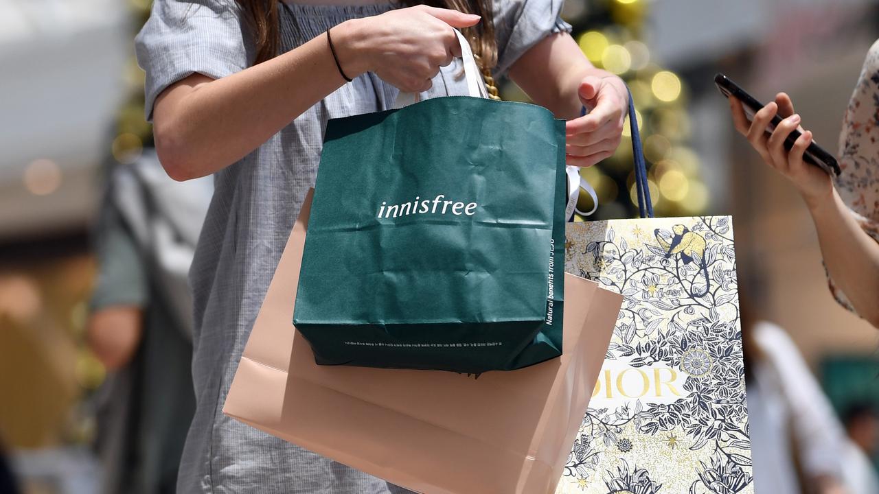  More Australians sneak away to Xmas shop 