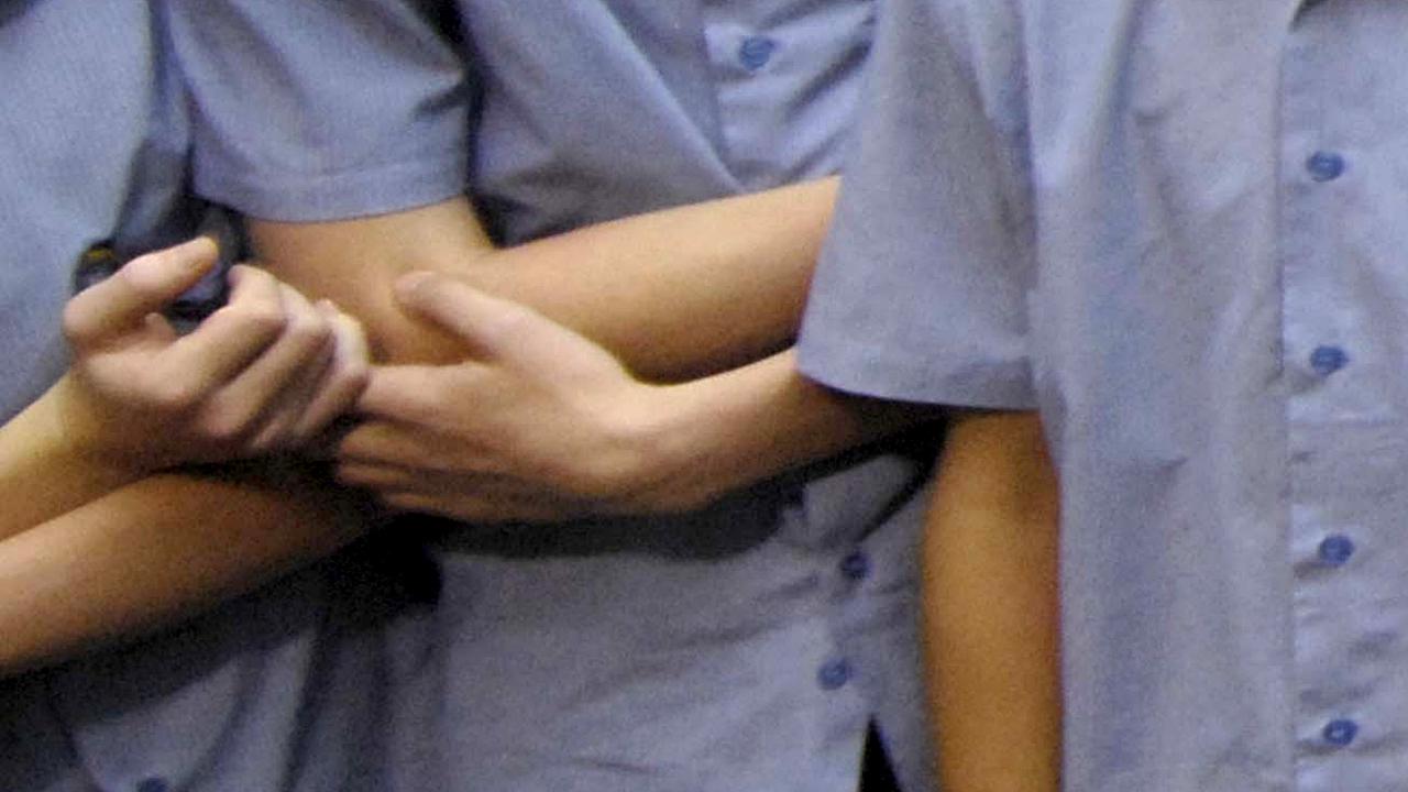 Teacher caught in hazing wins tribunal bid