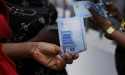 Nigerian naira drops to record low on official market
