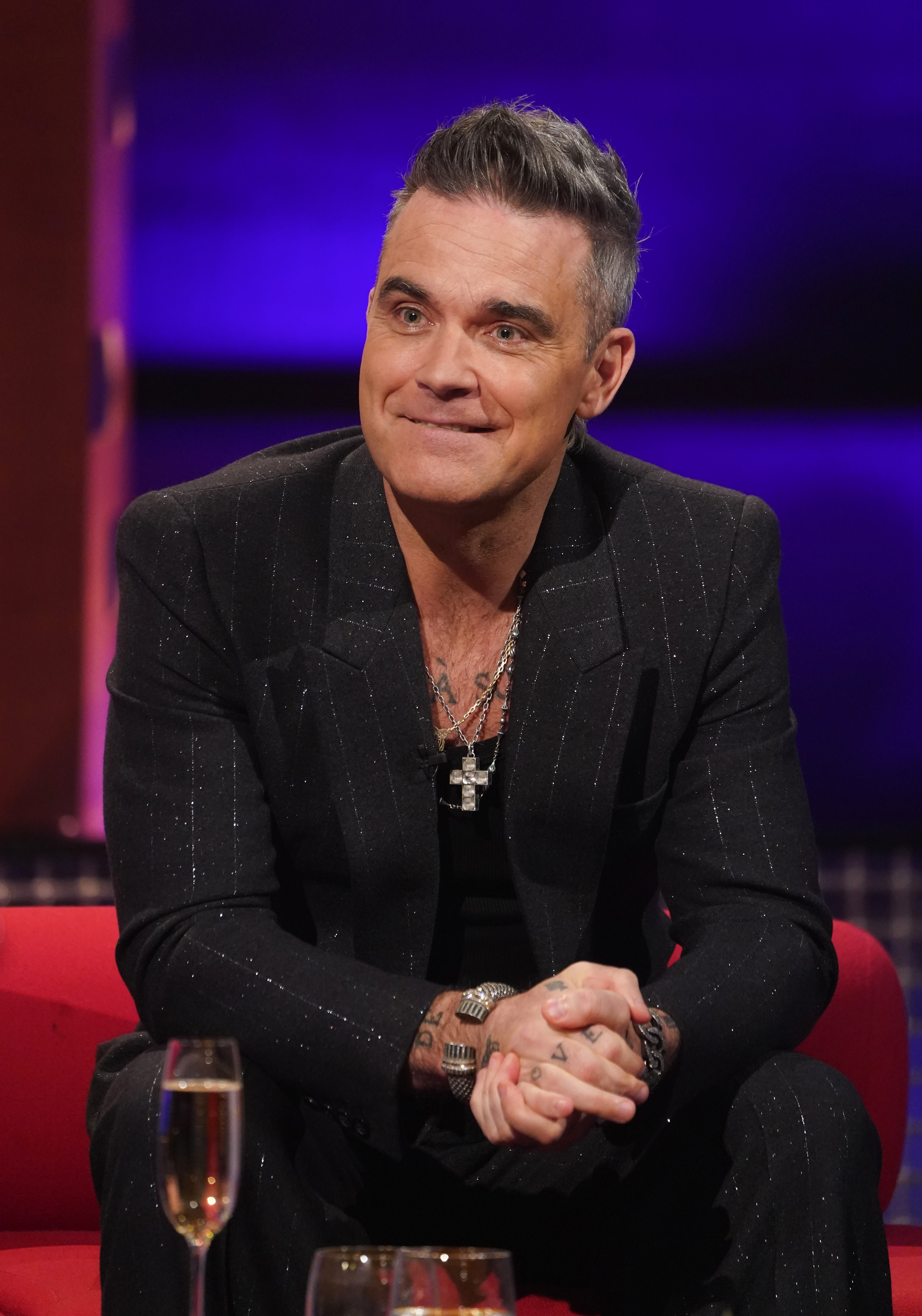  Robbie Williams reveals he sees himself in Harry Styles 