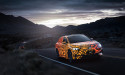 Futuristic electric cars steer tech expo