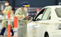 Deaths from virus spike amid call for calm