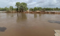 Flood victims sleep rough amid aid delays