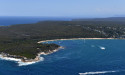 Three rescued after boat flips off Sydney