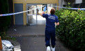 Slain woman's partner under 'house arrest'