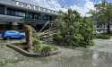 'Mini-cyclone' smashes buildings in NSW regional city