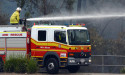  Warnings downgraded as bushfires rage across Queensland 