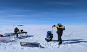 Scientists battle blizzards for million-year ice summit