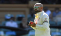  Cricket-Kuhnemann, Khawaja put Australia on top after spin mayhem 