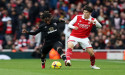 Soccer-Nelson keeps Arsenal on course in title race with late winner