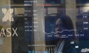  Australian shares finish down amid rocky road warnings 