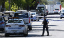 Armed man shot dead by police officer in Sydney