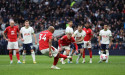  Soccer-Kane double helps Tottenham lift gloom with win over Forest 