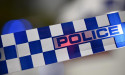 Police hunt armed assailant in Queensland town