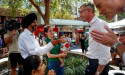 It's all handshaking and bubs for Dom in Libs' old hood