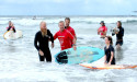 Exhausted surfer triumphant after smashing world record