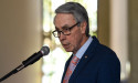 Outgoing electoral chief says democracy 'in safe hands'