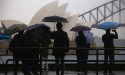 Aussies count coins and avoid rain with Easter at home