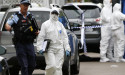 Man shot dead after allegedly stabbing cops