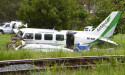 Pilot climbs free of wreckage in transport plane crash